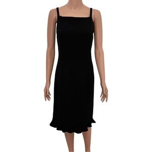Black dressy dress by Yansi Fugel.